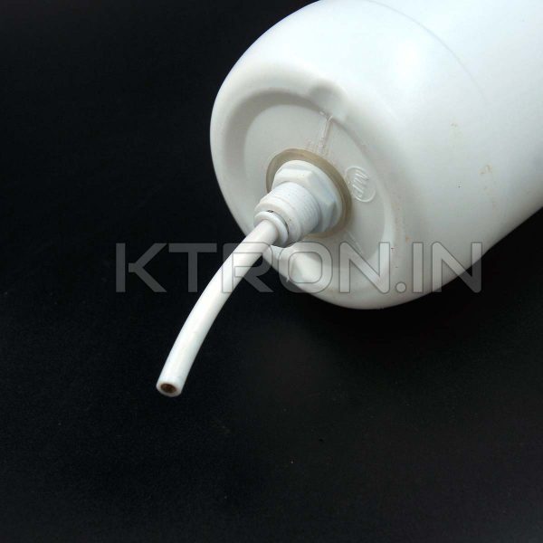 Pipe inserted into connector on bottle